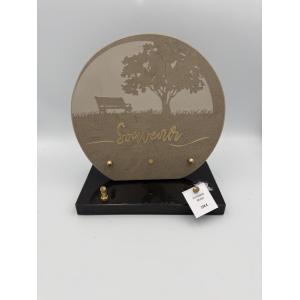 Plaque funéraire en céramique beige motif paysage socle granit noir